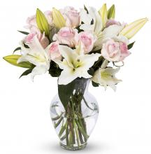 Pink Roses and White Lilies in a vase Pink Roses and White Lilies in a vase